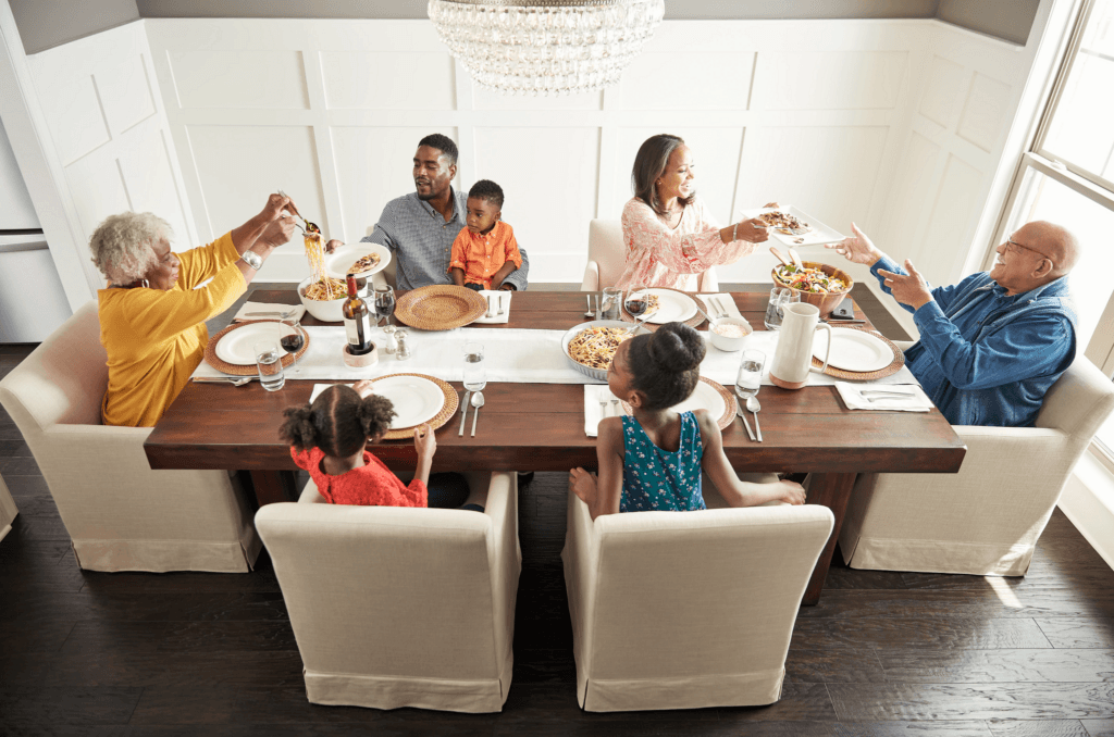 Family enjoys meal | Frazee Carpet & Flooring